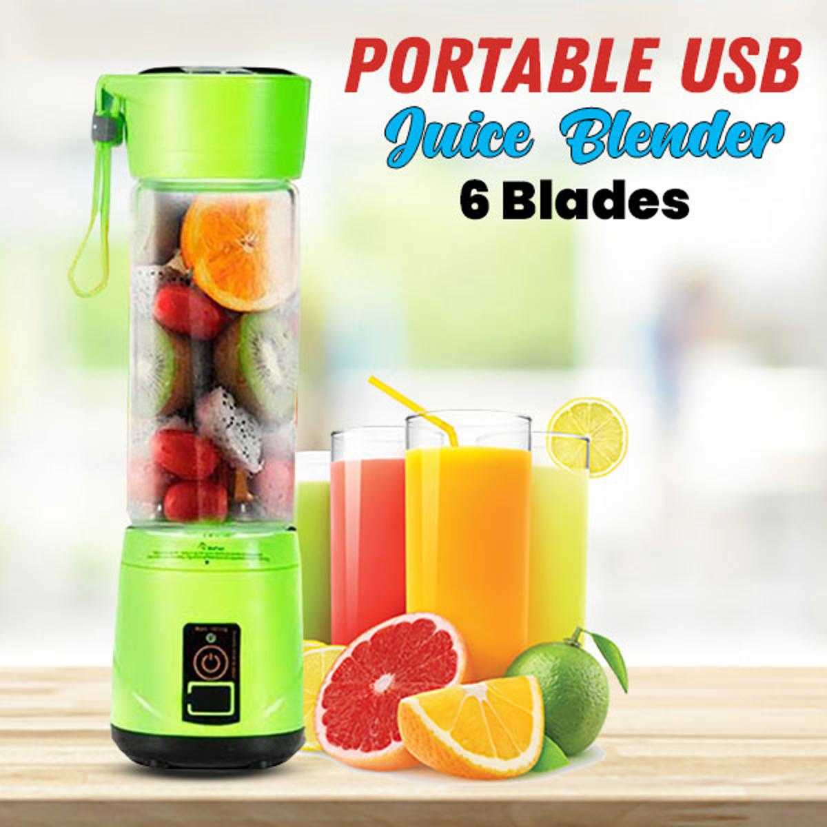 AVIOX portable USB juice blender filled with fruit and surrounded by fresh fruit juices.