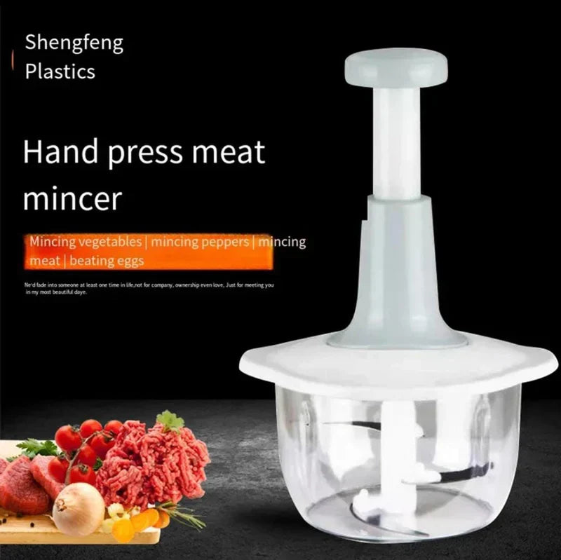 AVIOX manual press food chopper with minced meat and vegetables on a cutting board.
