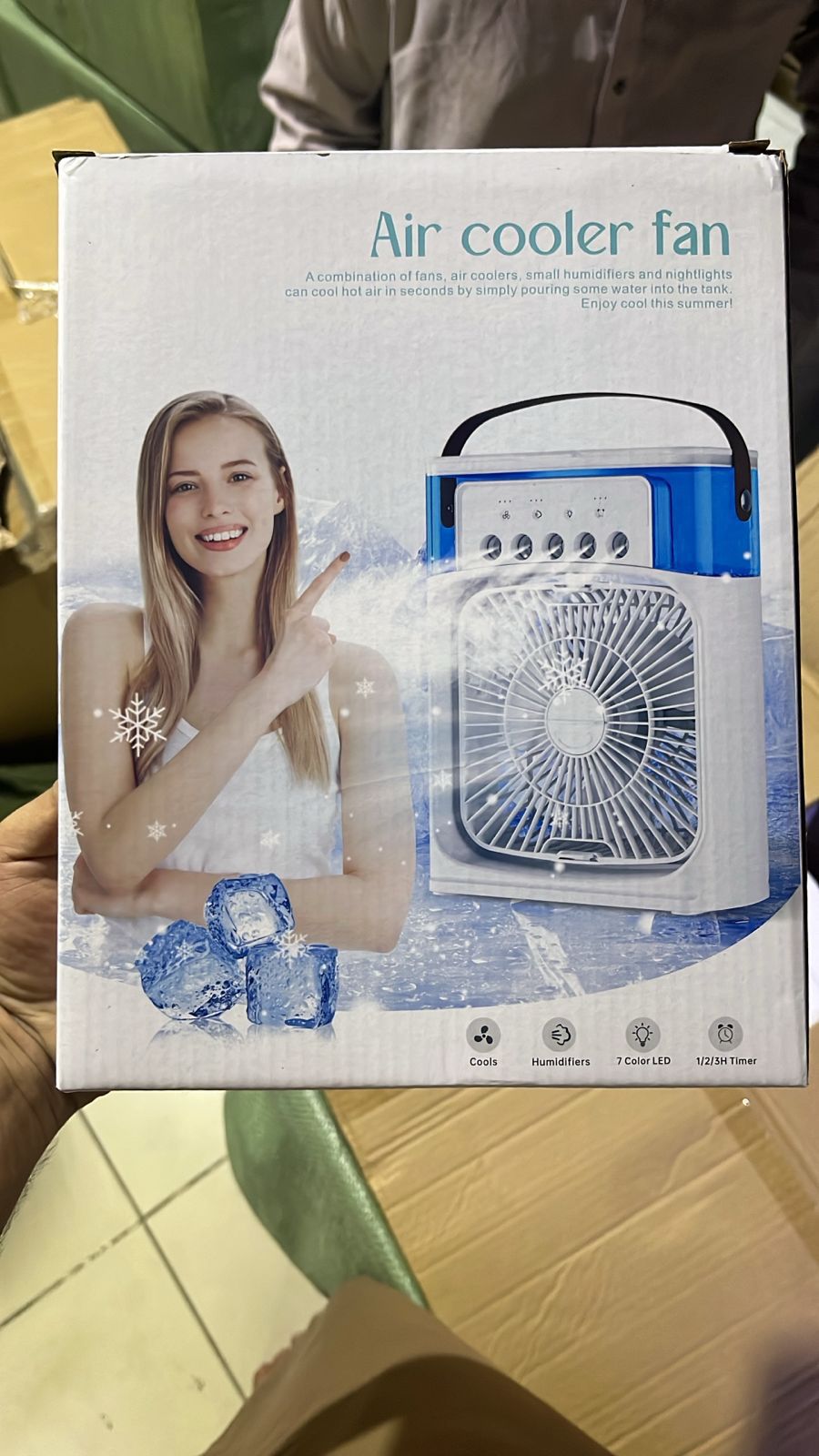 AVIOX portable mini air cooler fan with USB rechargeable cooling and humidifier features.