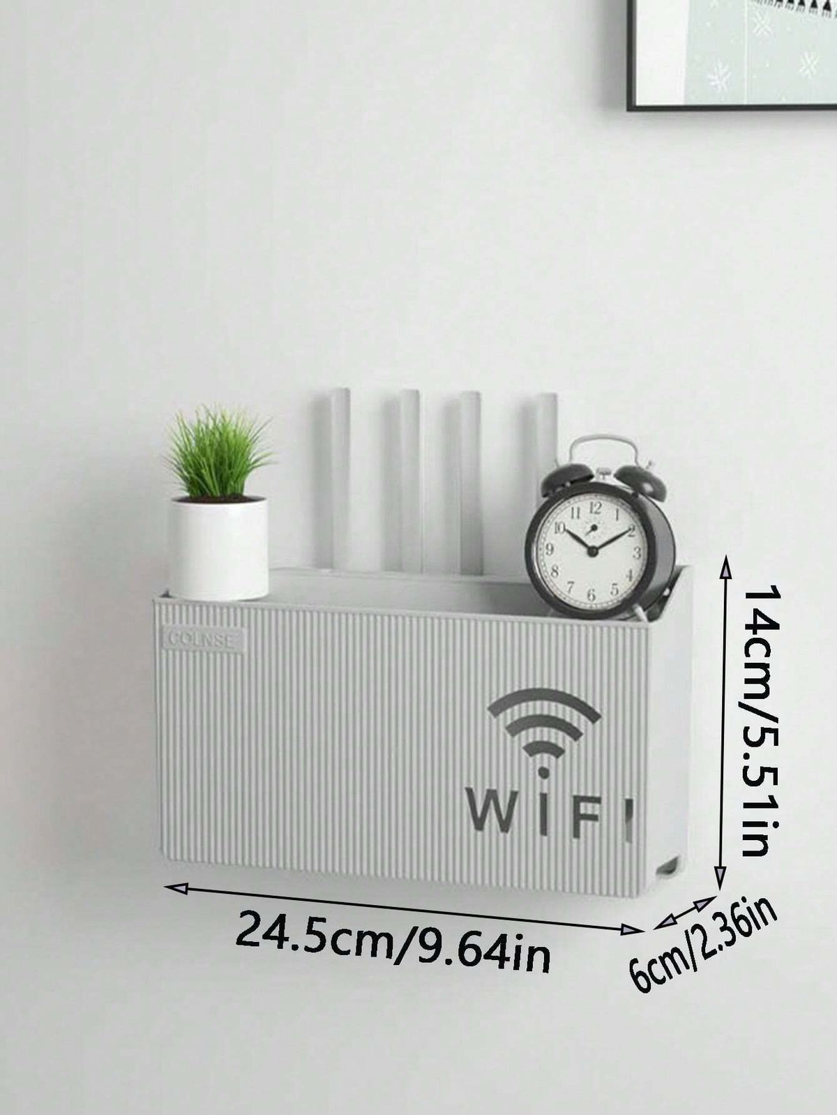 AVIOX white wall-mounted router storage box with WiFi icon, holding a plant and alarm clock.